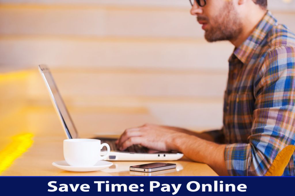 person paying bill online