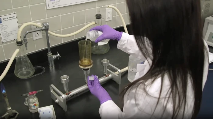 a scientist performing tests