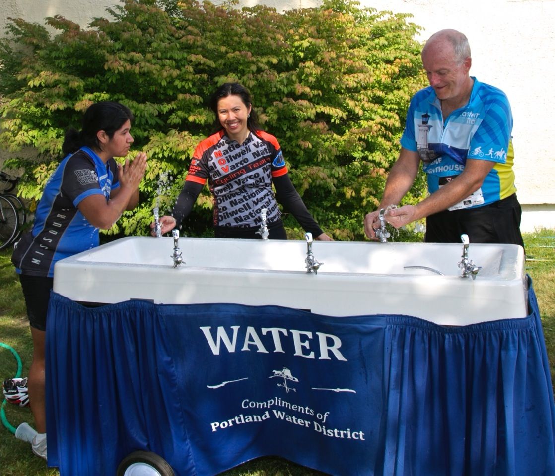 people using the portable water fountain