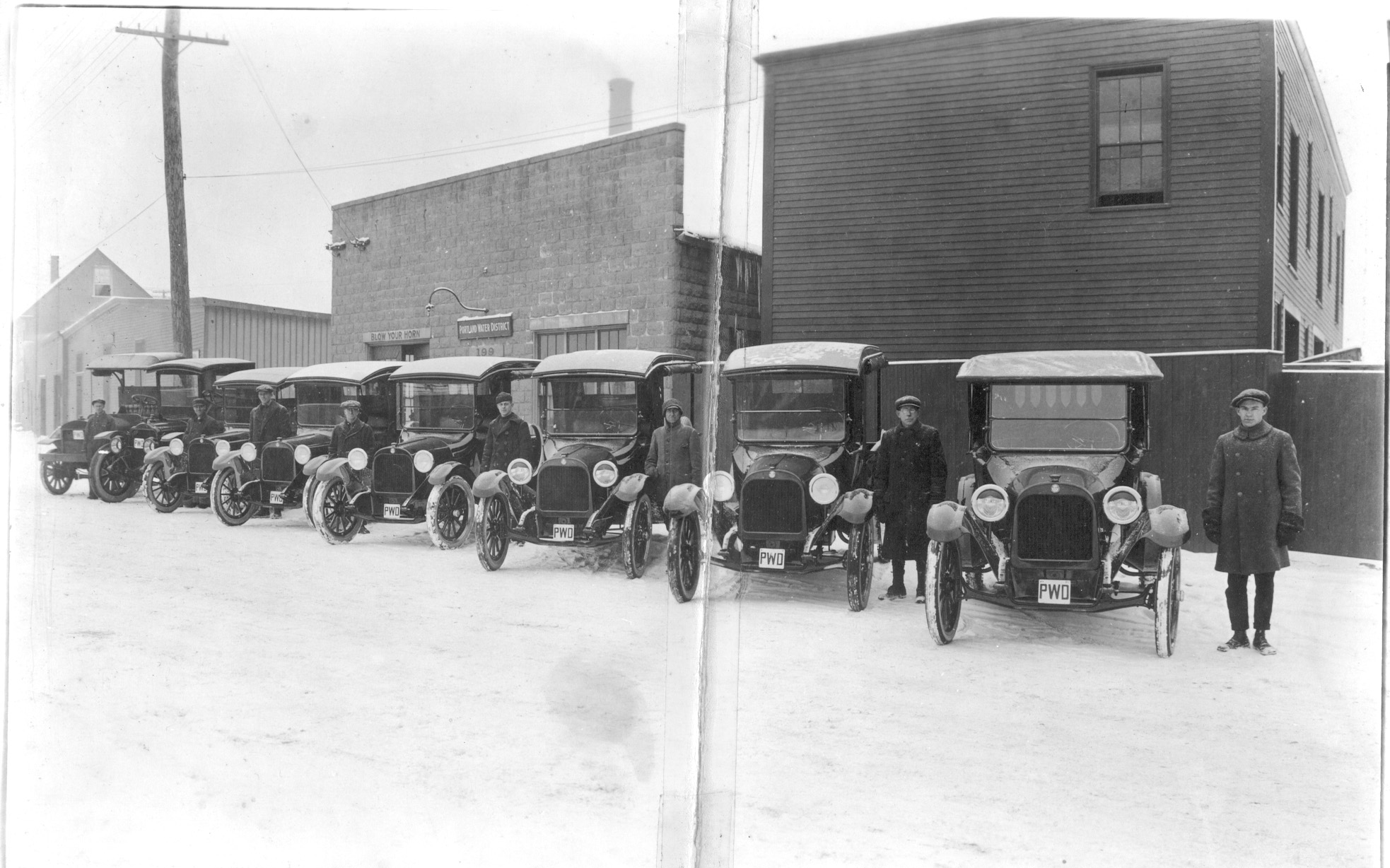 historic photo of PWD fleet vehicles