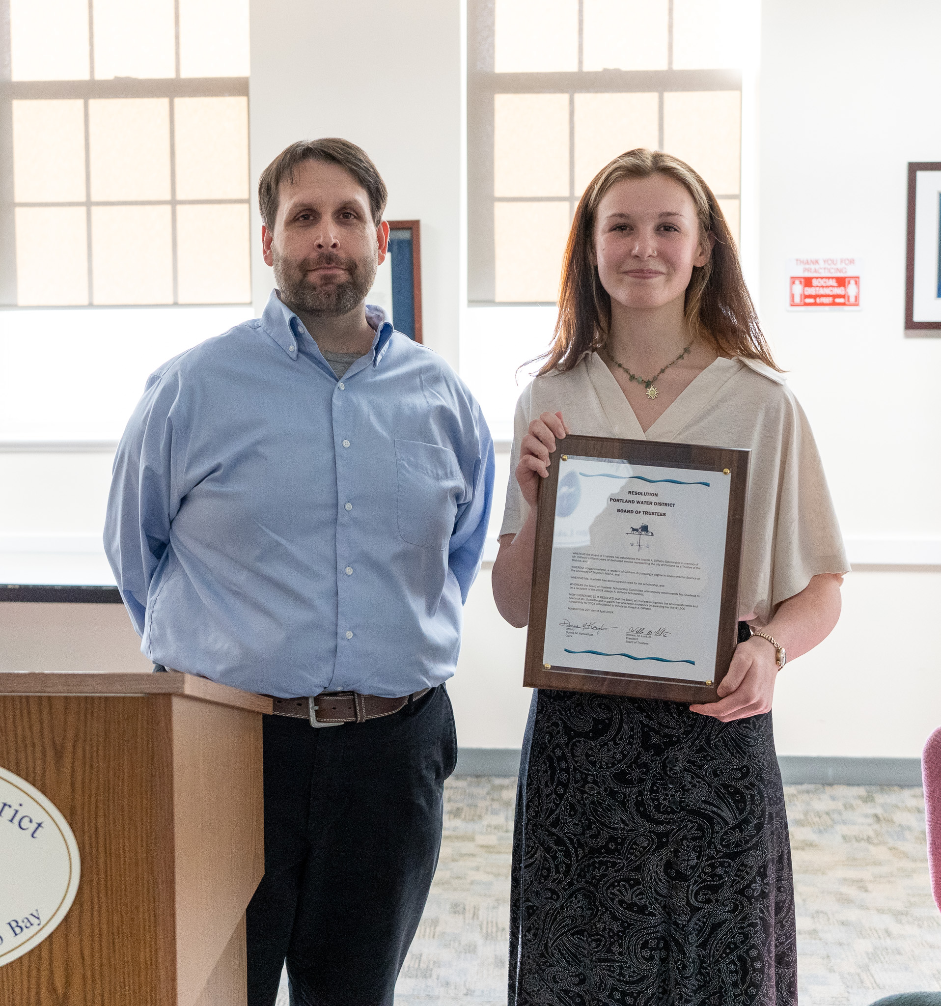 Fred McCann presenting a PWD scholarship to a student